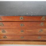 Old chest of drawers with black marble