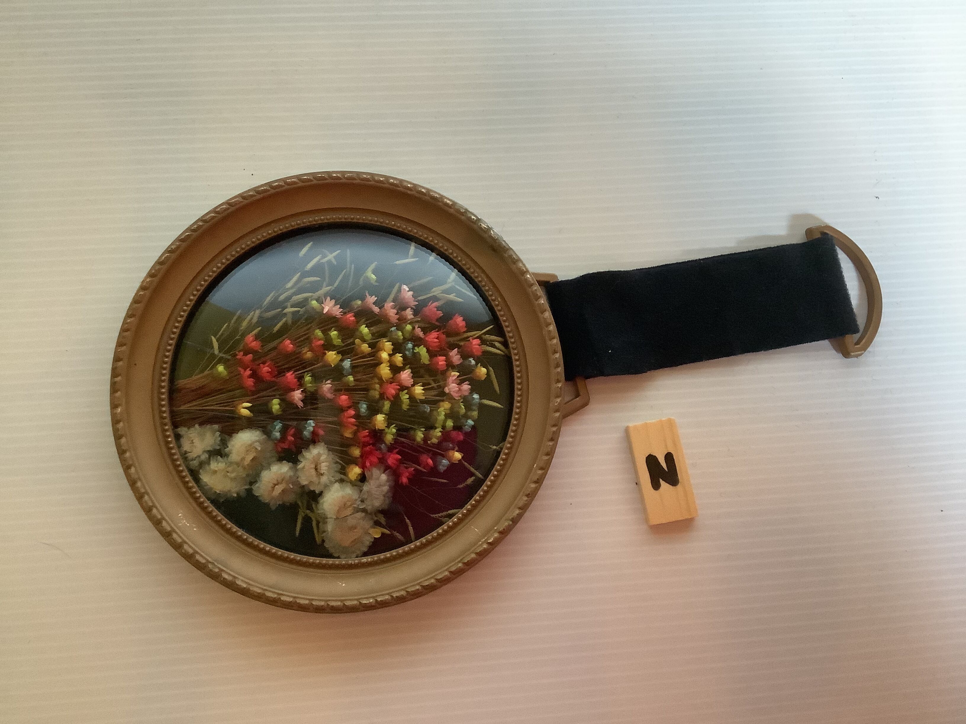 Old small round frame curved glass natural dried flowers