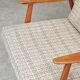Pair of Boomerang-style armchairs in ecru beige fabric, 1960s.