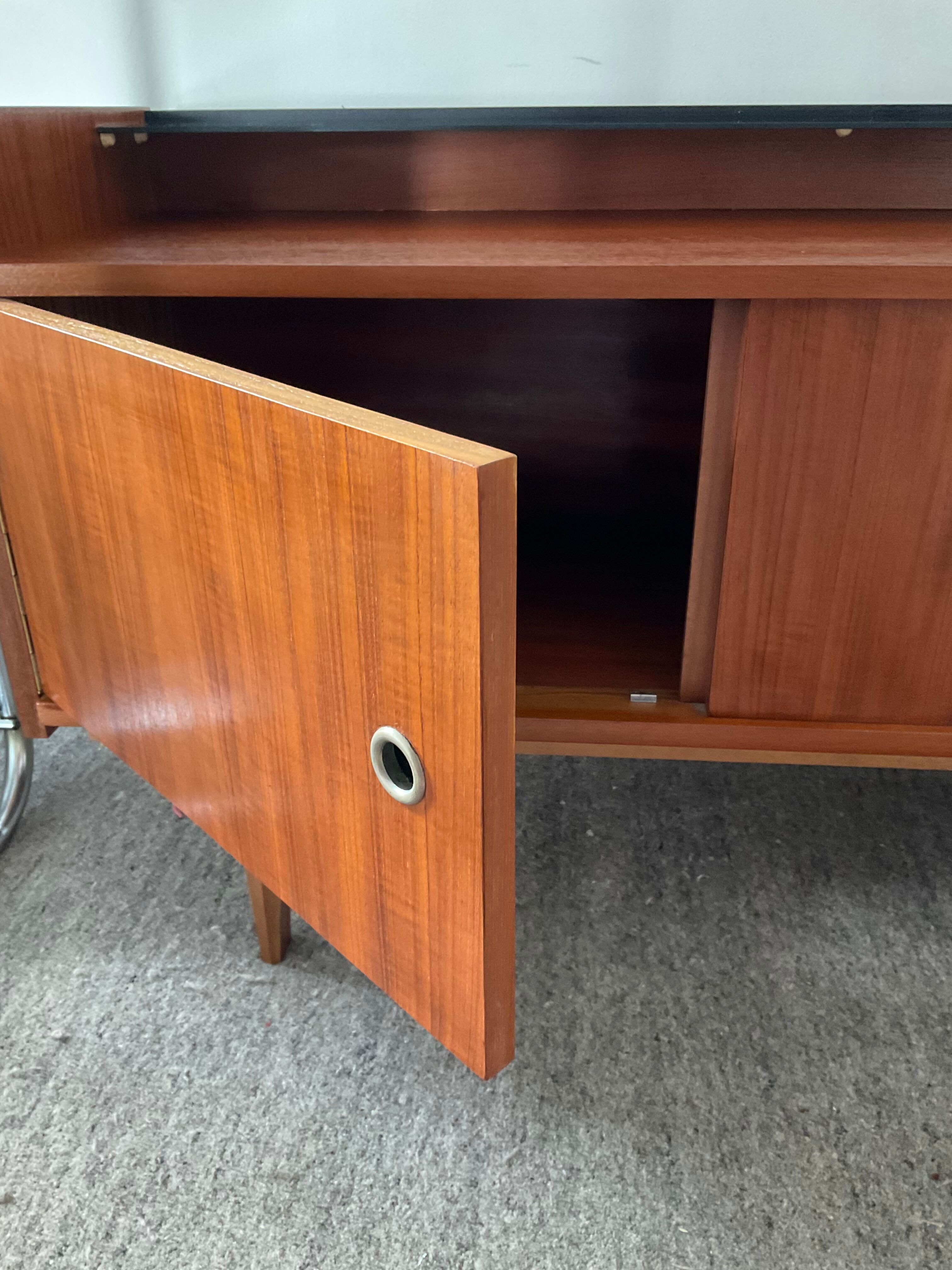 Scandinavian teak row from the 60s