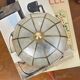 Small ceiling light with a mother-of-pearl shade from the 1950s.