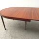 Dining table by Kofod Larsen for Faarup Mobelfabrik in teak, Denmark 1960.