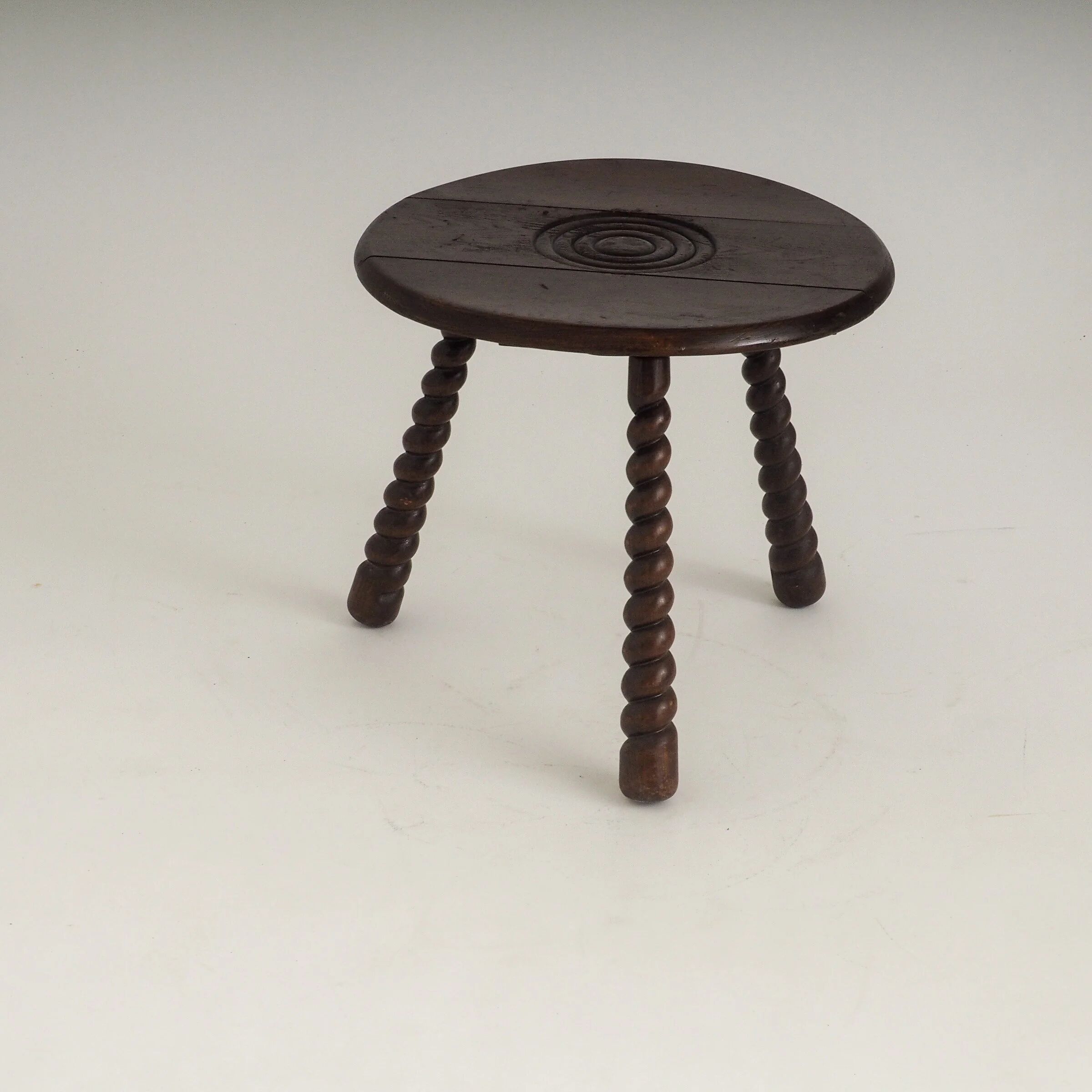 French oak tripod side table attributed to Charles Dudouyt