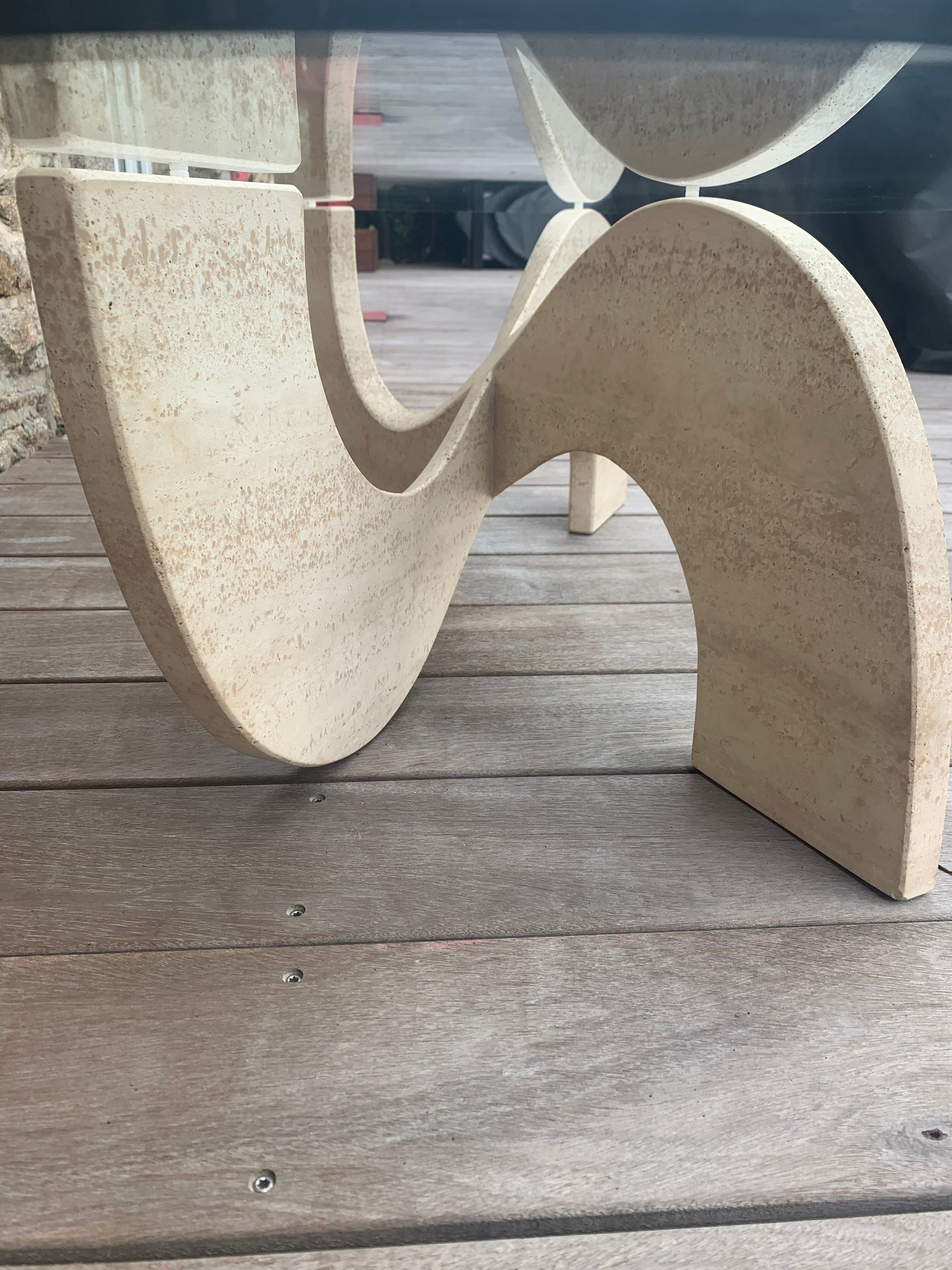 Trendy coffee table in glass and travertine