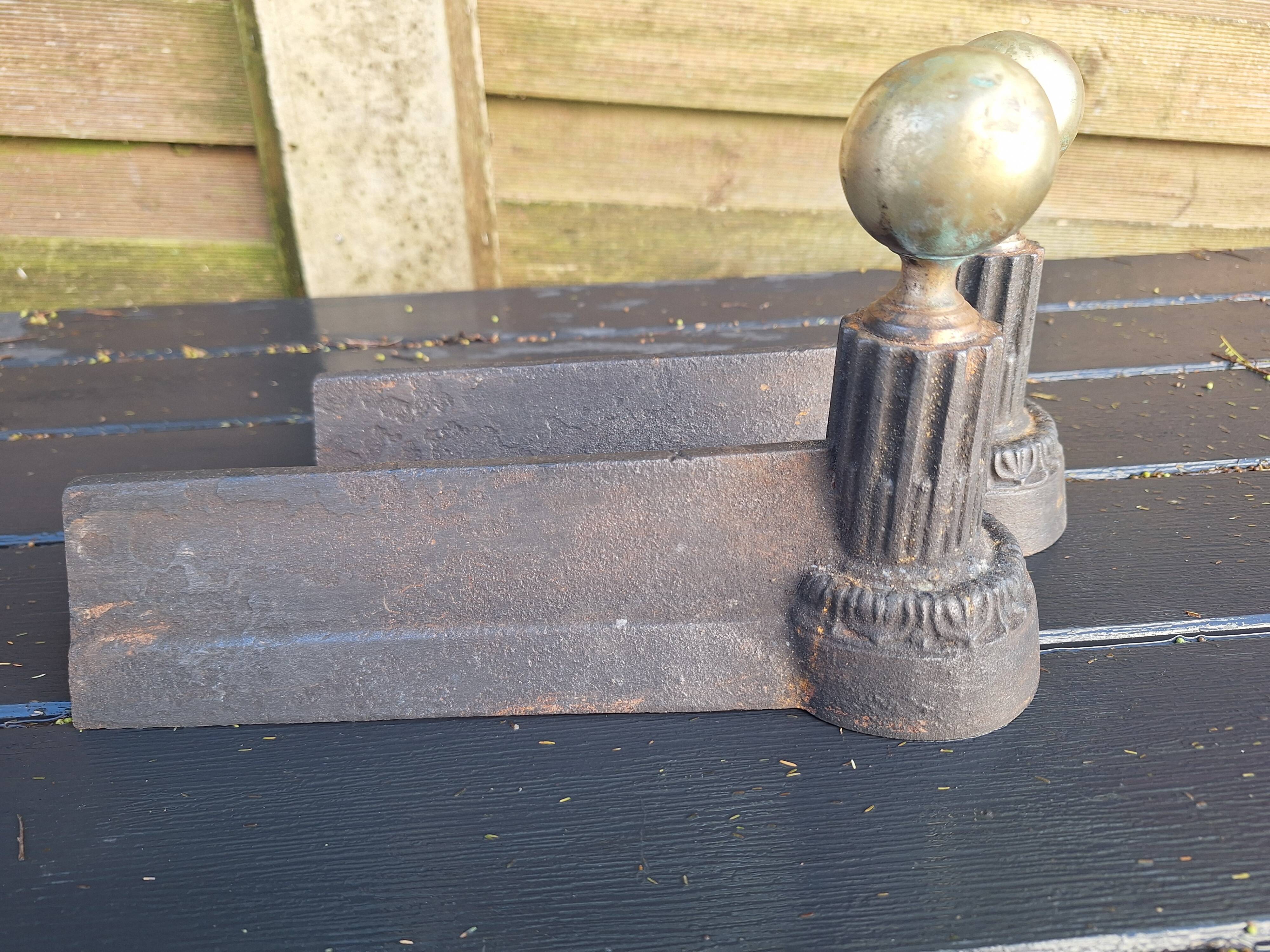 Small Napoleon III cast iron and brass andirons