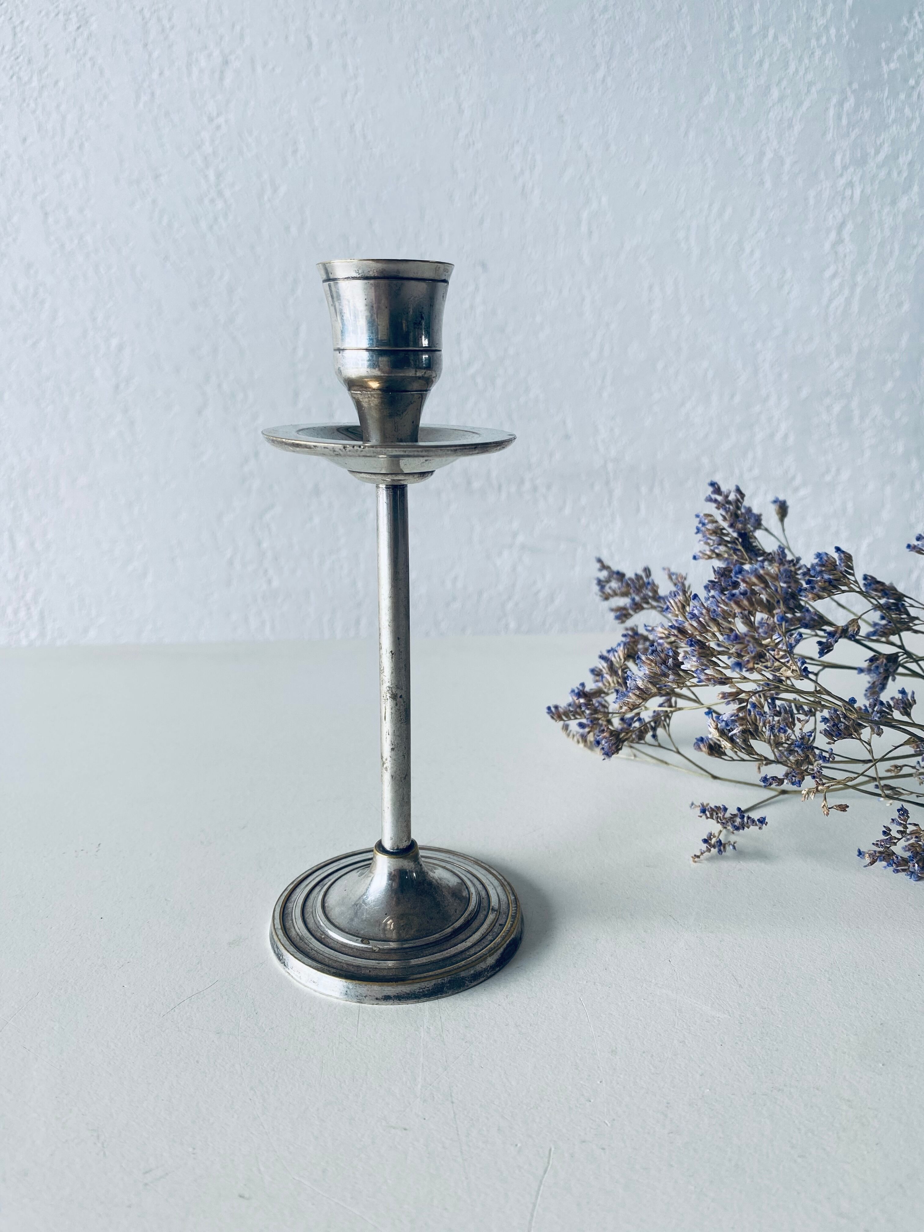 Twisted silver candle holder