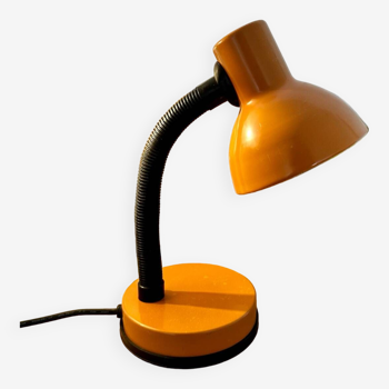 Orange articulated desk lamp