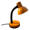 Orange articulated desk lamp