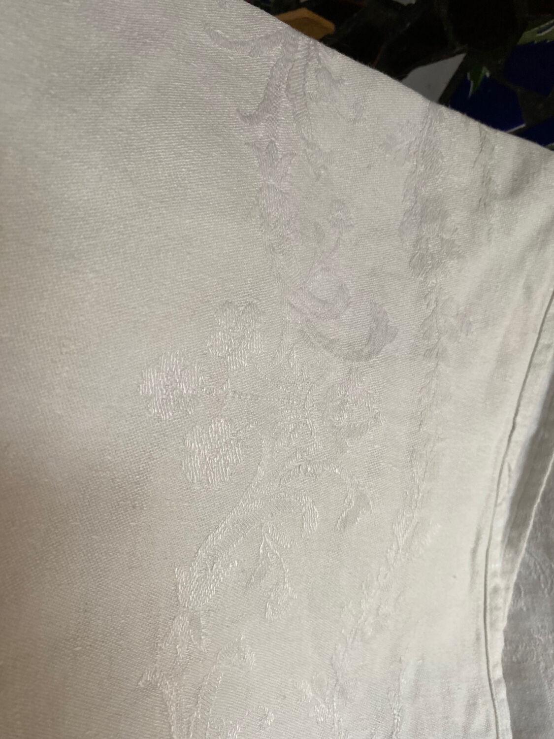 Large white cotton tea towel with damask thread.