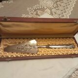 Painted silver metal cake peel in its box