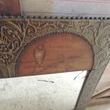 framed mirror with bird motif