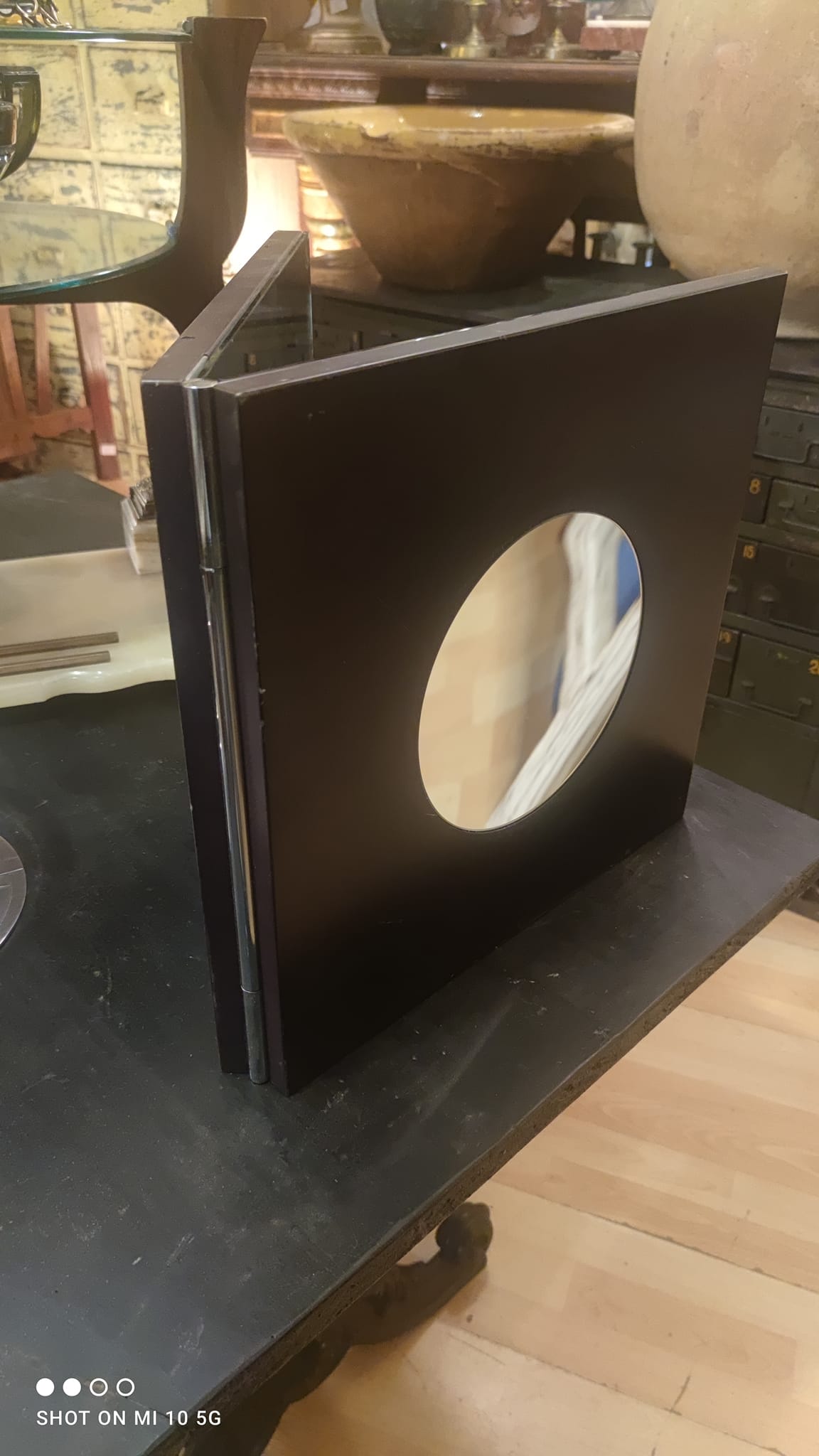 Wall mirror with a wooden frame and Wenge finish, dating from the late 19th century