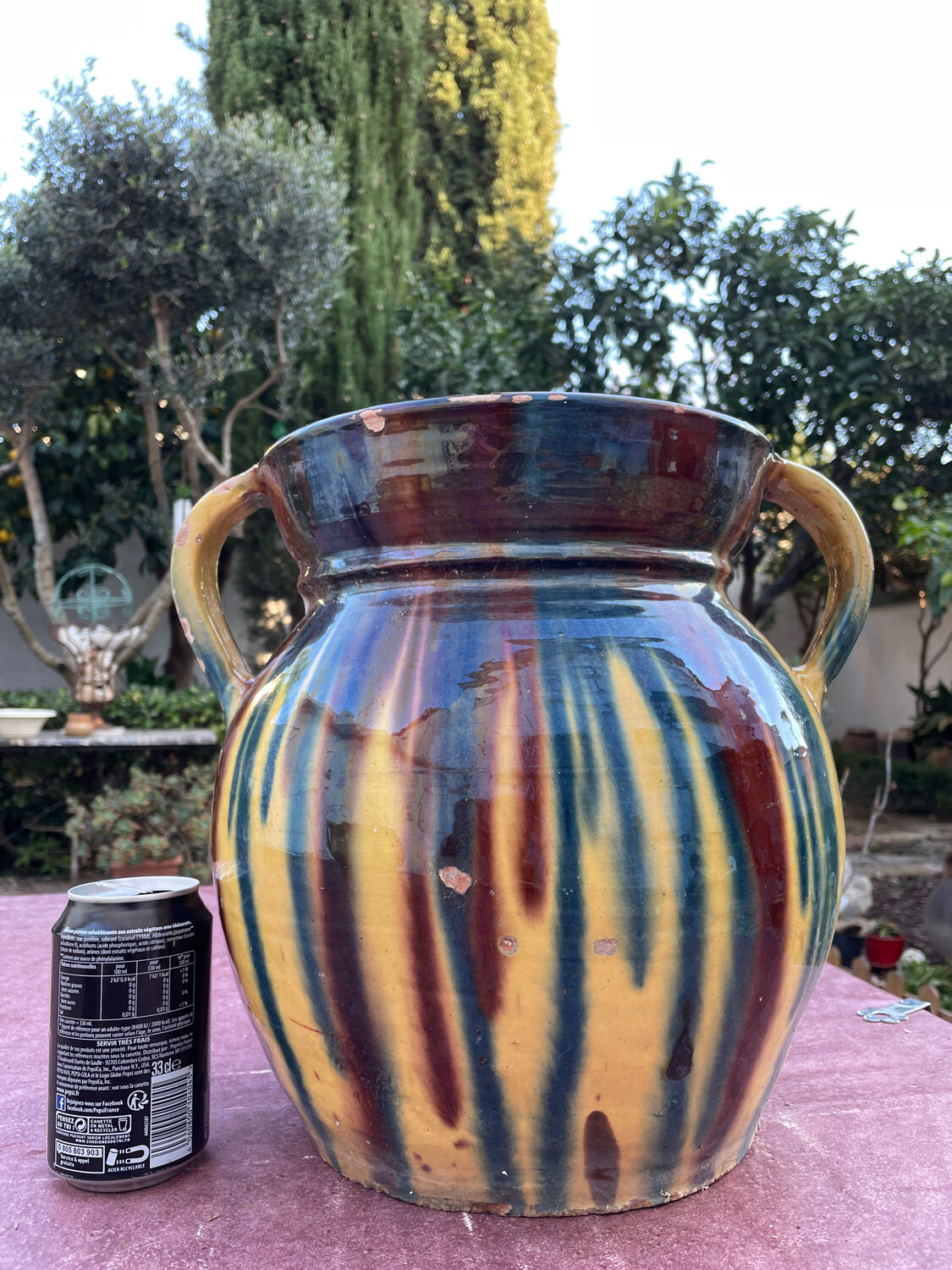 Old flower jar with two glazed earth handles