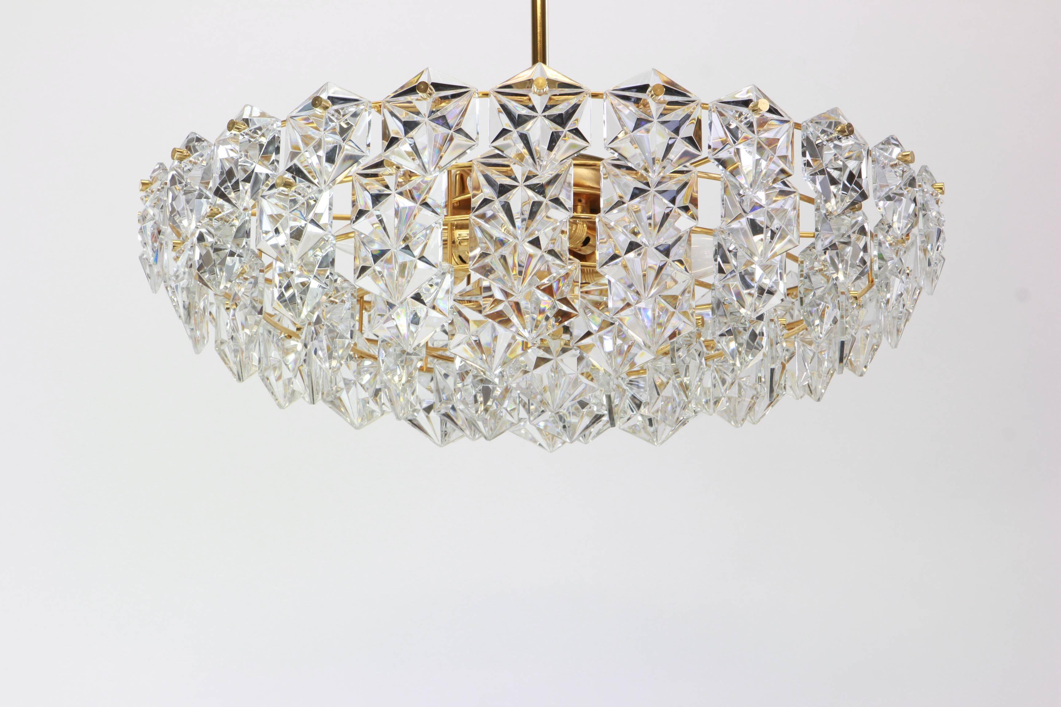 Chandelier, brass and crystal glass by Kinkeldey, Germany, 1970s.