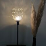 Table lamp with an antique tulip lampshade in glass and a golden foot