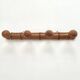 Wall-mounted coat rack in bamboo effect wood