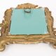 Miniature vintage gold mirror with angels, Italy, 1960s
