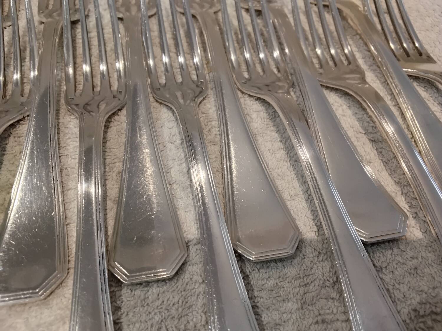 12 silver-plated table forks by Christofle America