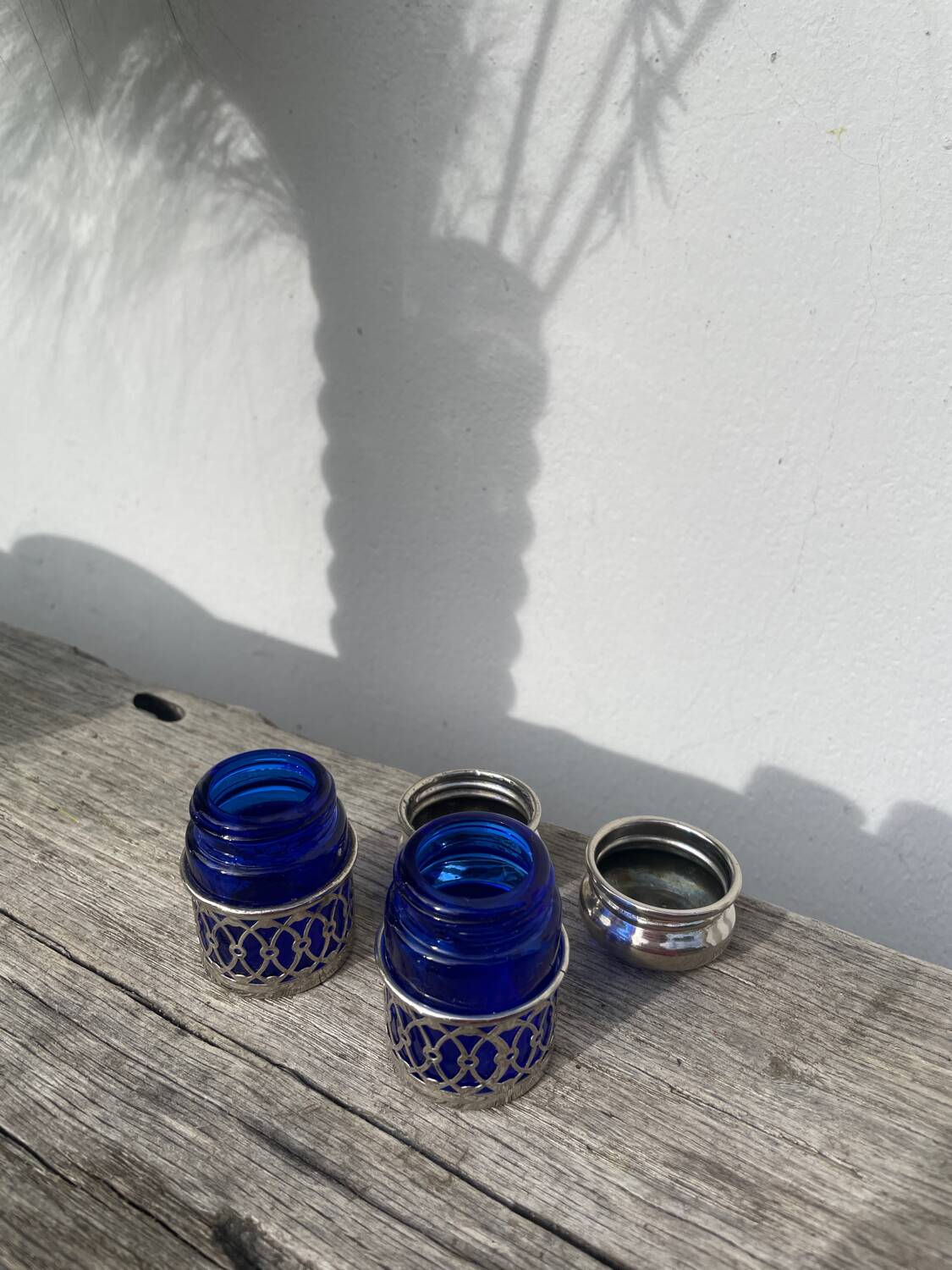 Silver-plated metal and blue glass salt and pepper shaker