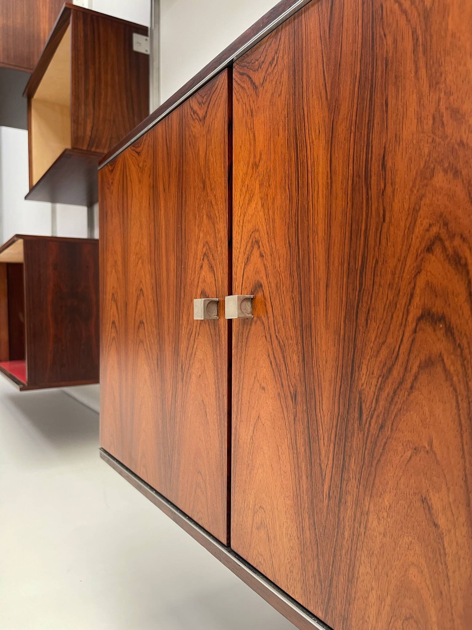 Large colorful wall unit in luxury wood