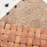 Moroccan polka dot hallway, white and brown beni ourain rug, berber design