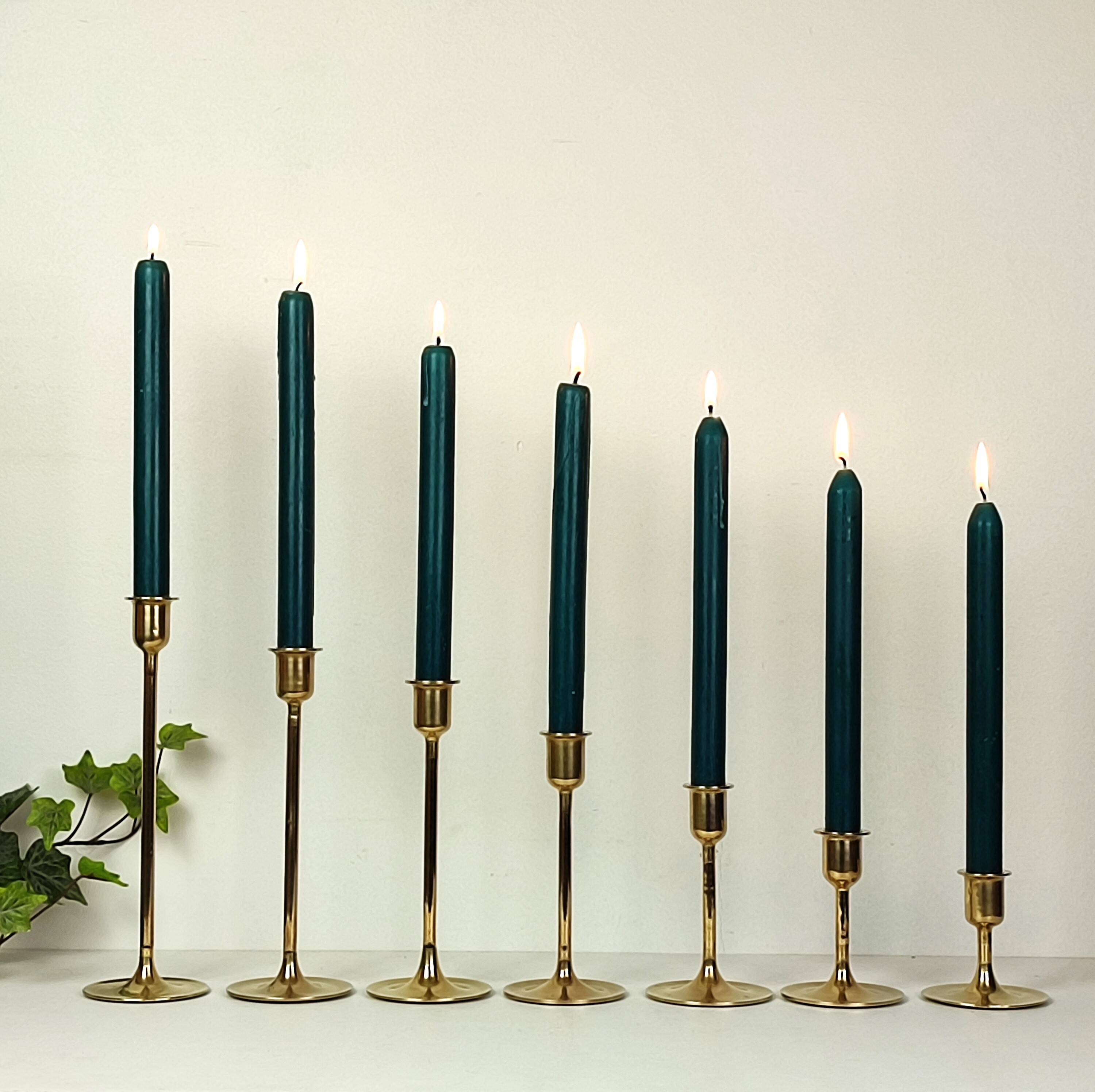 Set of 7 brass candlesticks