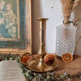 Cellar rat candle holder with brass pusher