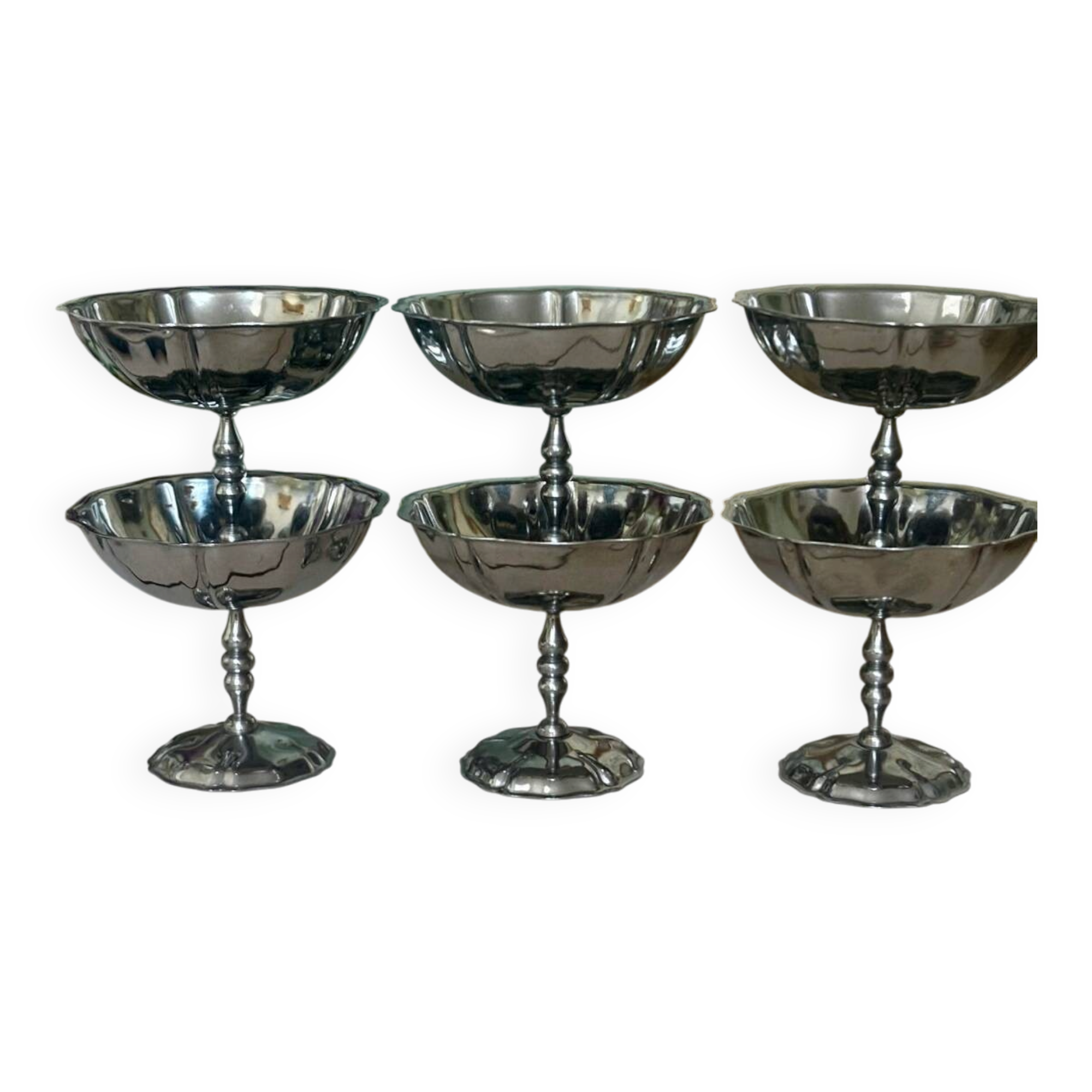 Vintage set of 6 finely engraved stainless steel bowls.