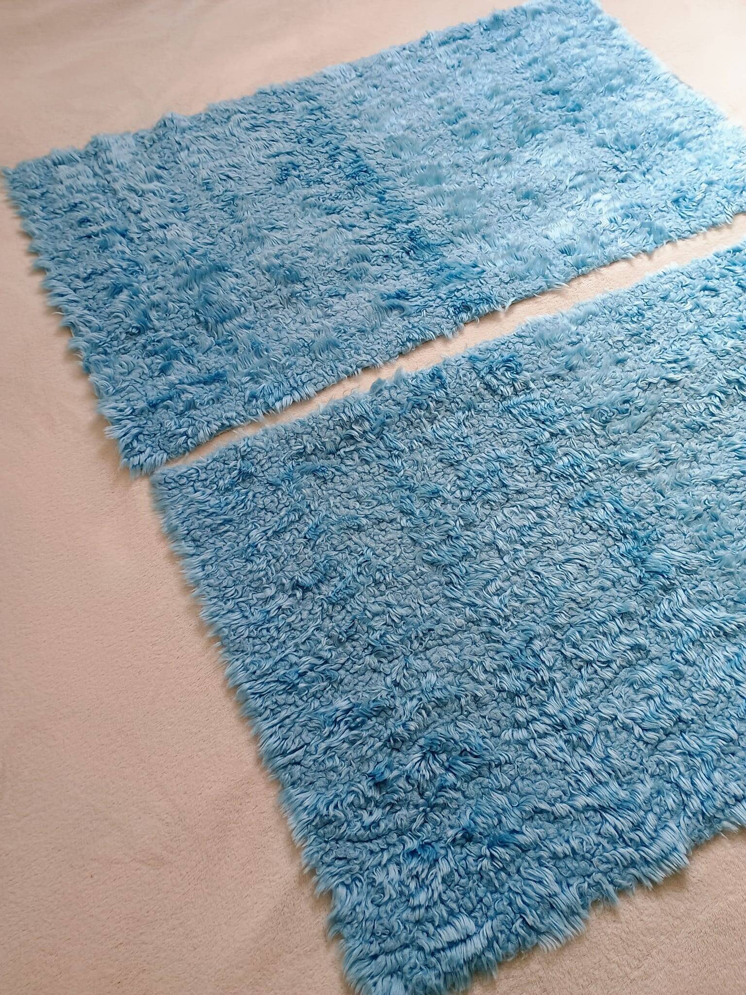Set of two vintage sky blue rugs from the 70s