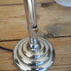 Art Deco suspension globe in white opaline with an aluminium stem.