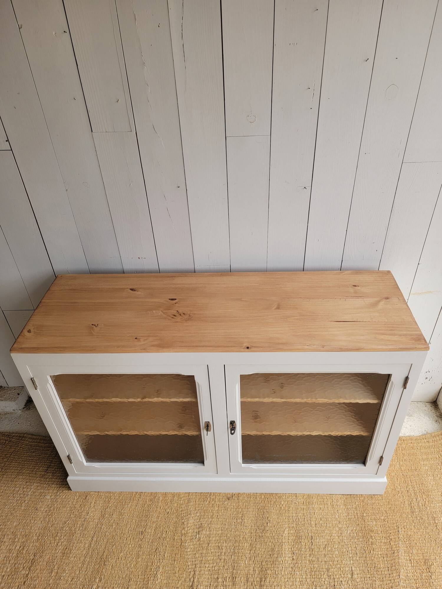 Beige glass and wood sideboard