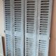 Pair of old shutters louvered cupboard doors
