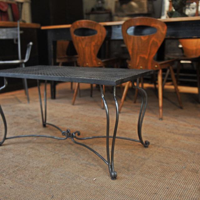 Metal coffee table perforated wrought iron foot 1940