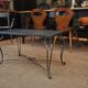 Table basse metal perforé pied fer forgé 1940