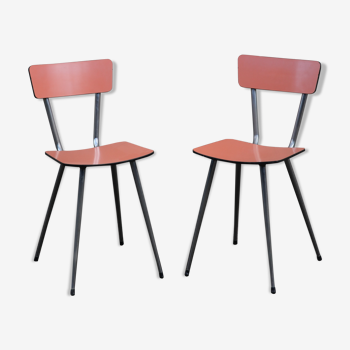 Pair of salmon pink formica chairs