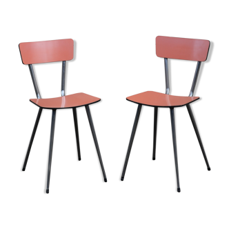 Pair of salmon pink formica chairs