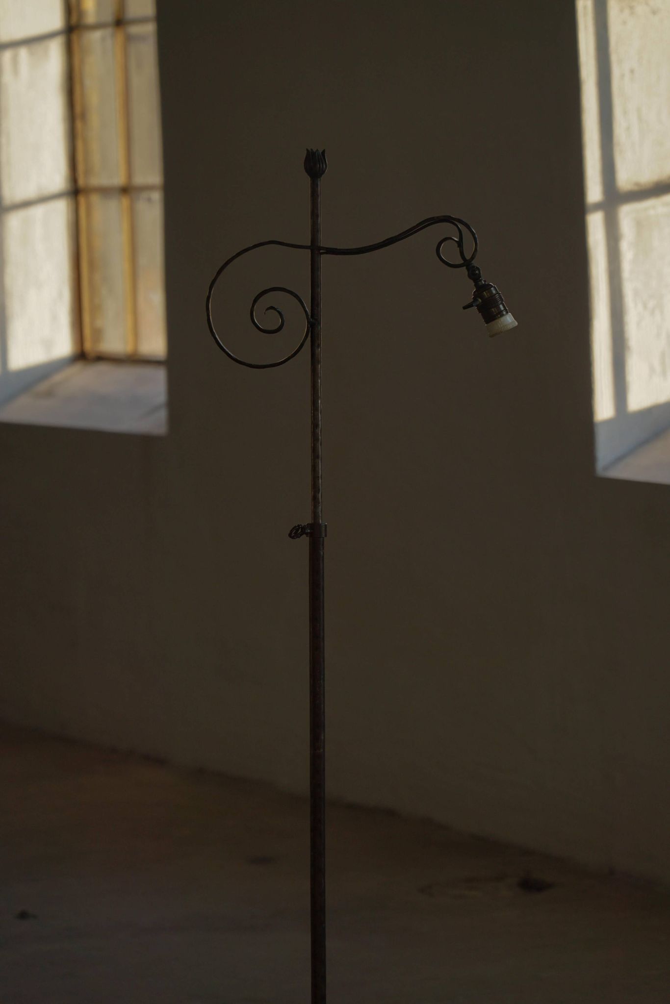 20th-century wrought iron floor lamp with swirling detail, Danish Art Deco.
