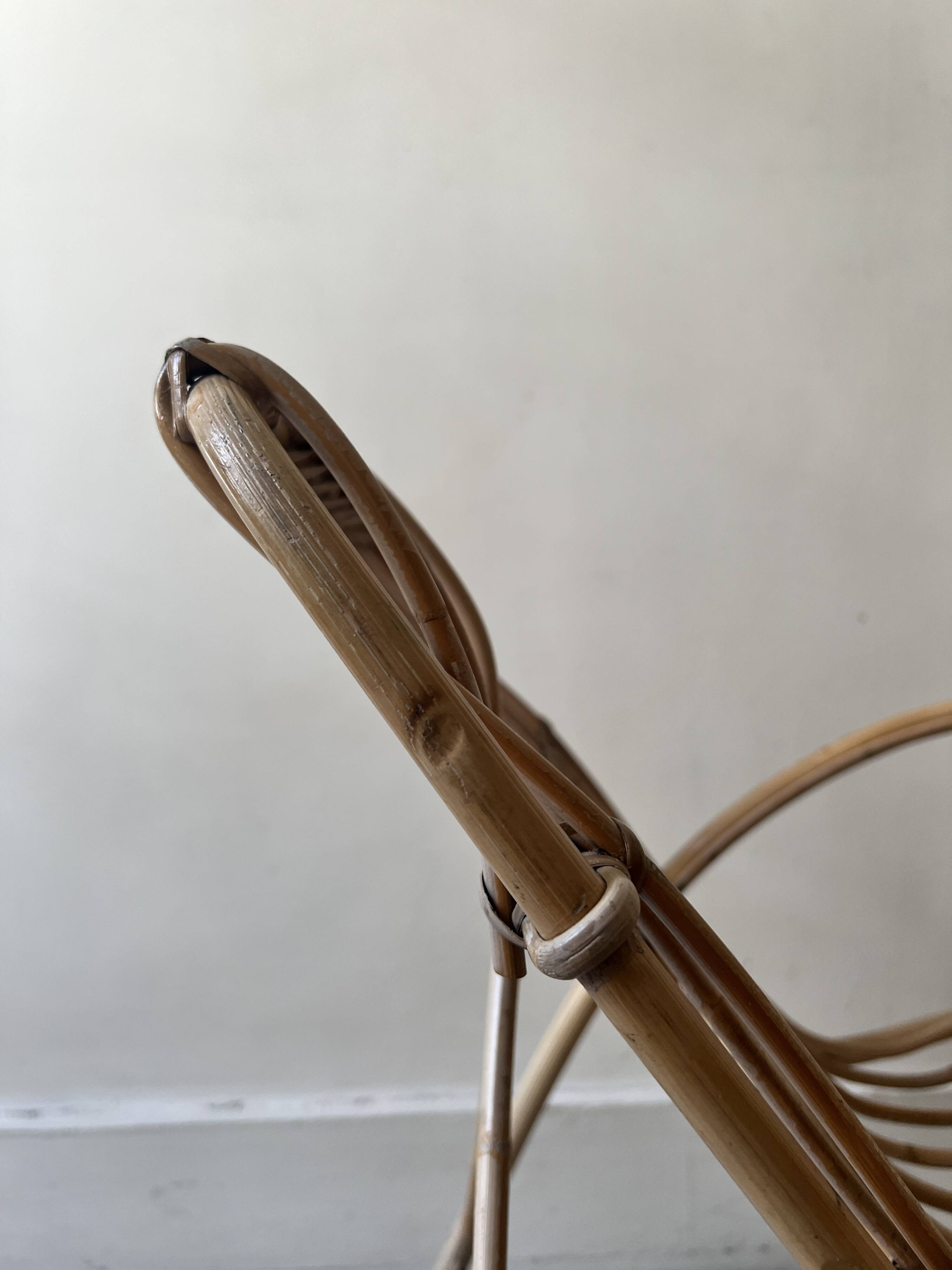 Child's rocking chair in rattan/bamboo, France 1950.