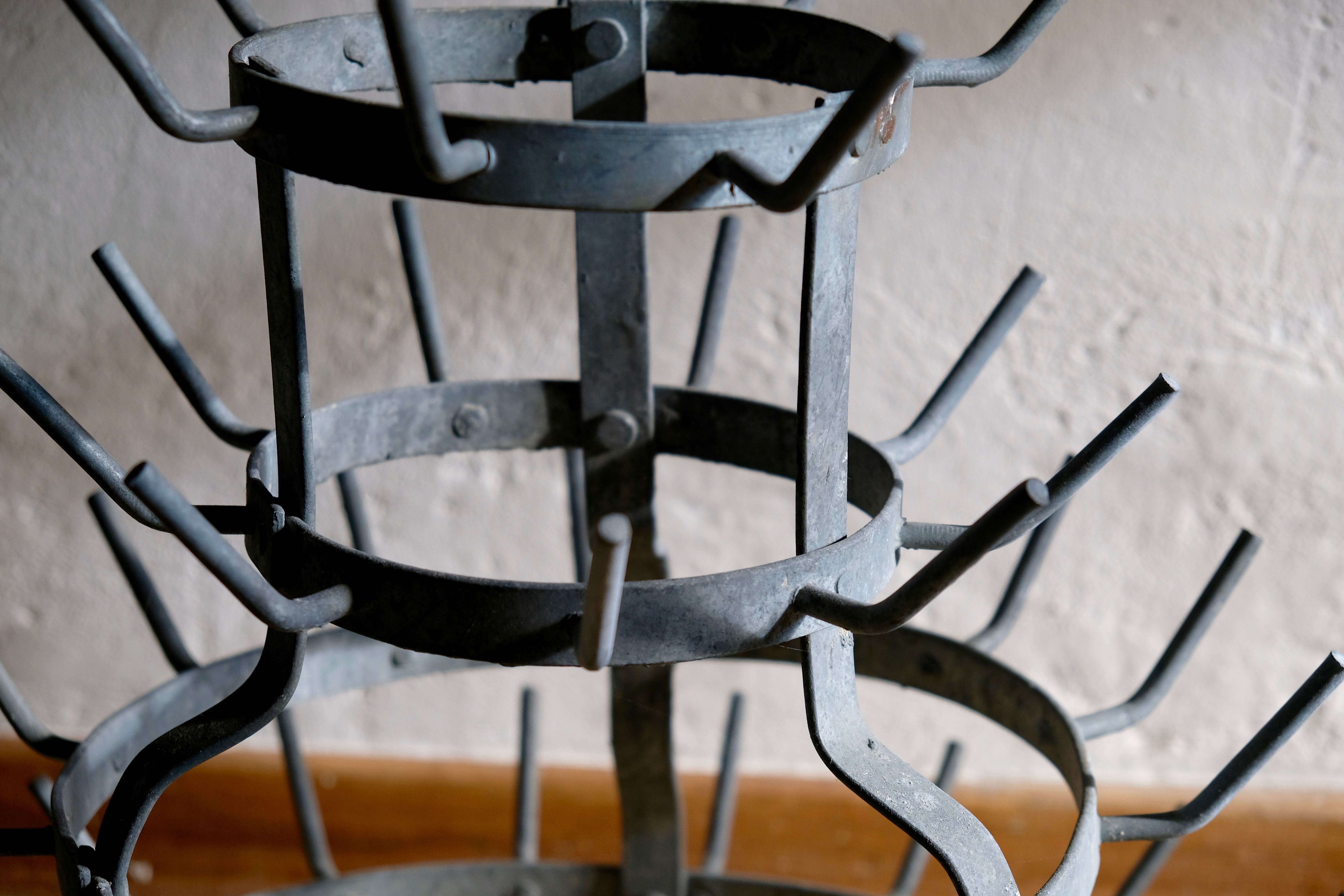 Old zinc bottle drainer