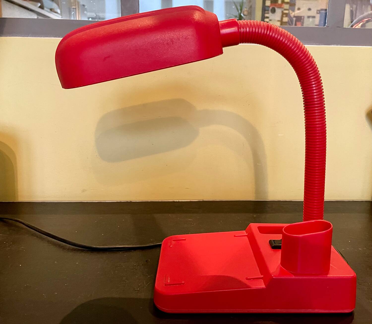 Vintage red articulated desk lamp