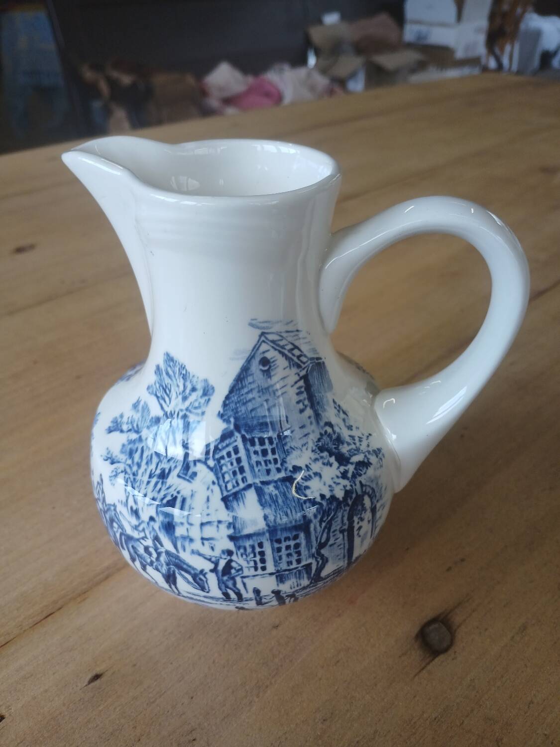 Small old pitcher in iron earth