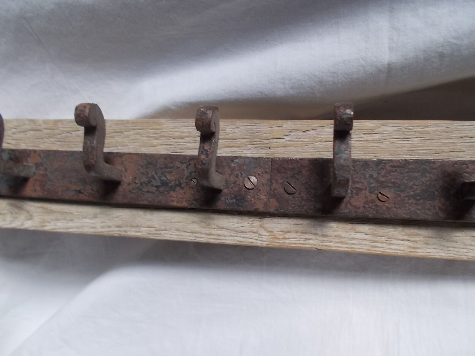 Wrought iron and wooden rack