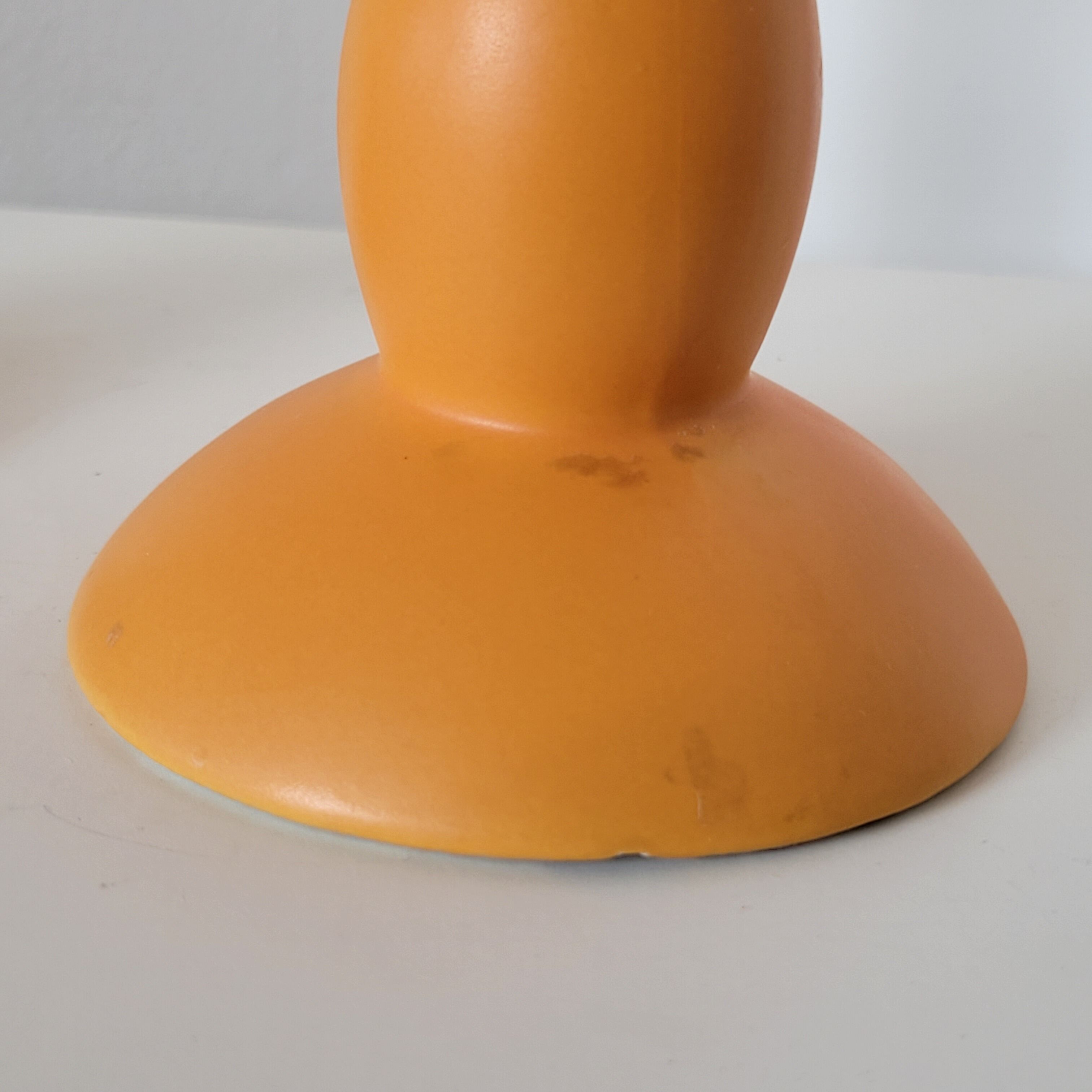 2 orange ceramic candle holders