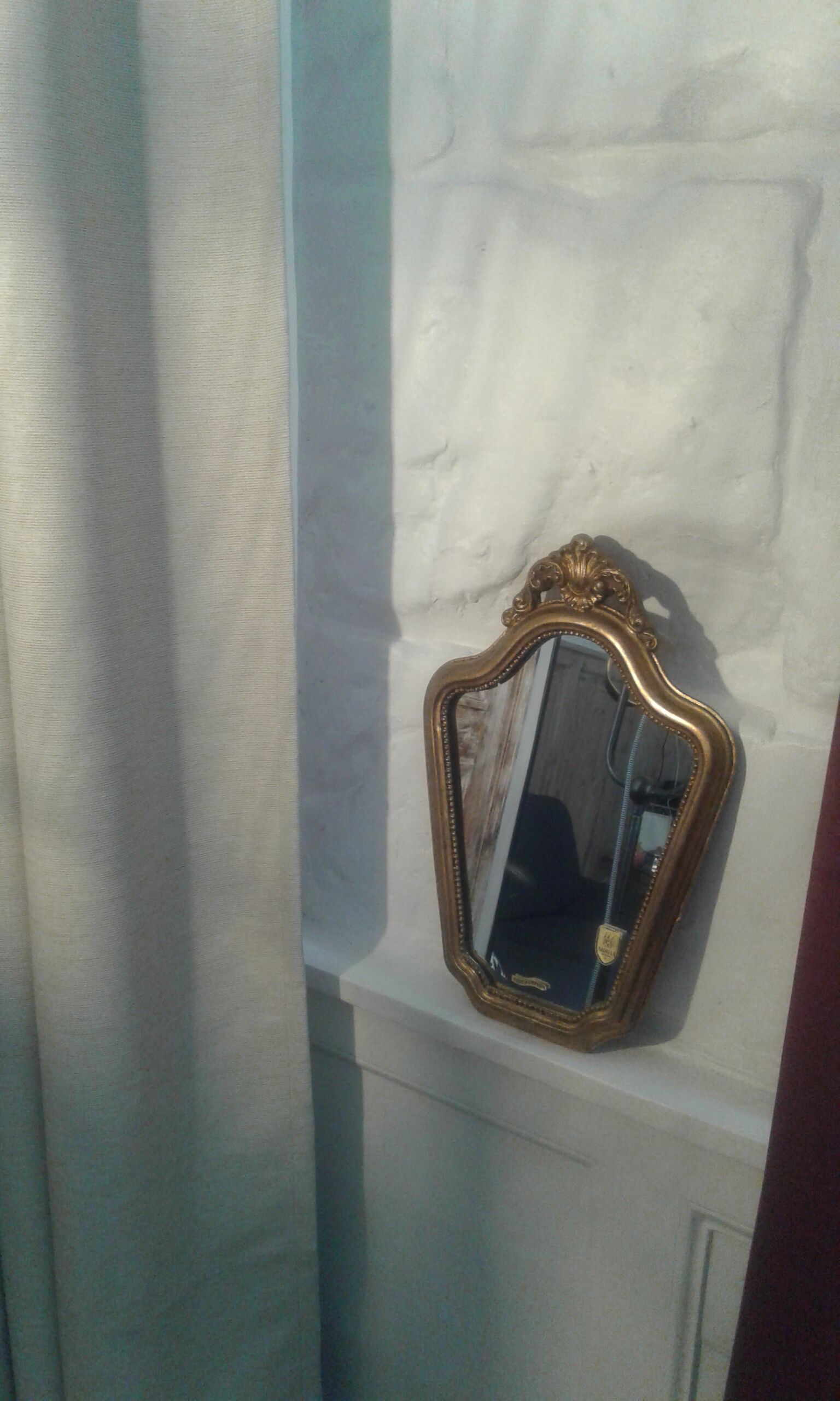 Golden mirror 25x39cm