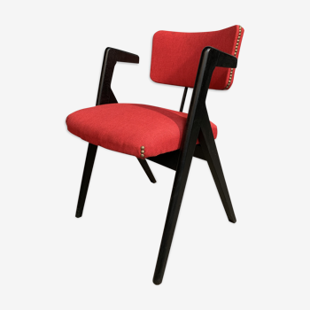 Red fabric chair with black base