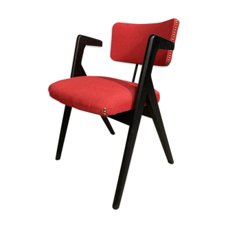 Red fabric chair with black base