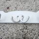 antique cast iron enamelled coat rack