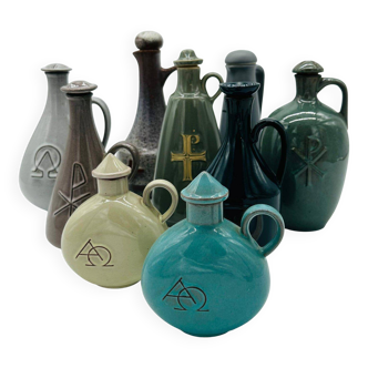 Set of nine modern sculptural ceramic vases from the mid-century, Bauhaus influence.