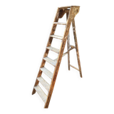 Antique authentic painter's stepladder in vintage patinated wood