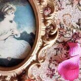 Medallion frame representing a little girl